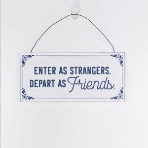 Enter as strangers depart as friends - Wood sign